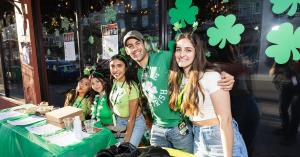 St. Patrick's Day Pub Crawl Check In. CrawlSF Staff outside San Francisco Bar during Pub Crawl.