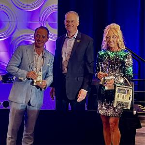 Sal Salpietro, Stephanie Salpietro, co-founders of ATM UP awarded the Outstanding Service Award by Lonnie Talbert, CEO of ATMIA