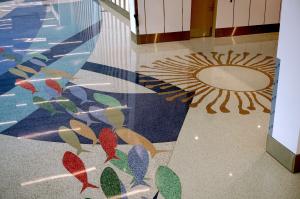 swimming fish and sun design in terrazzo