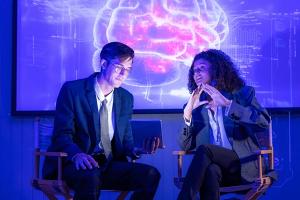 A presenter leads an AI governance webinar, guiding leaders through the 2026 playbook.