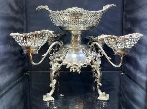 Tomas Bradbury sterling silver epergne centerpiece bowl from 1897, 47cm long by 52cm wide, weighing 3450 grams. Estimate: $18,000-$20,000