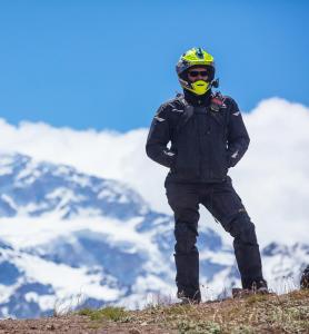 Bill Whitacre standing in front of mountains in Chile