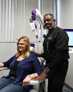 Dreamwork Wellness CEO Marcus Logan with TMS Therapy Client in Sherman Texas
