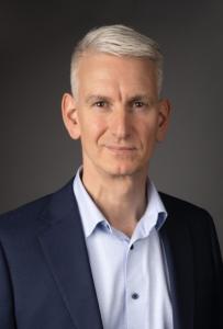 Headshot of Julien Godbarge, author of Crash and [Burn] LEARN.