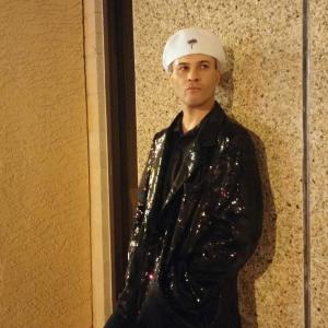 Sam Mraovich dressed in his flashy Las Vegas jacket poses for a quick promo photo of his songs. 