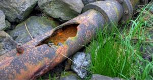 cast iron sewer pipe in southlake, tx backyard damaged by freeze-thaw cycle