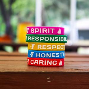 Character focus at MetroWest YMCA camps features daily recognition, including the awarding of character-based “Camp-Champs” bracelets to celebrate campers who model respect, responsibility, inclusion, and empathy.