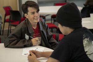 Two students taking part in a Narrative 4 Story Exchange.