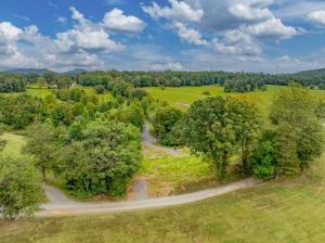 2± acre Madison County building lot. On site sewage system construction permit approved for a 3 bedroom drainfield. Drilled well permit approved • Virginia Department of Health permits must be transferred. Newly installed driveway; access to 2 state maintained roads