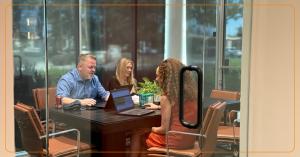 Katelyn Morgan meeting with clients during a family law consultation at The Valley Law Group in Gilbert, Arizona.