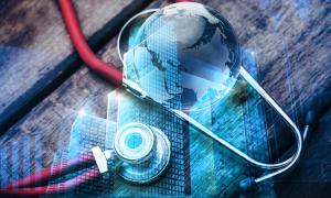 photo of a clip board with a crystal globe and a stethoscope around it