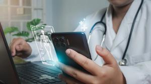 photo of a health care professional in a white lab coat with a clip board and a vial of medication
