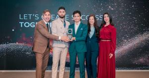 GenZone team receiving Platinum Tier Partner recognition from Dubai’s Free Zone authority at an official award ceremony.