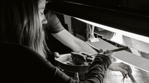 Cat McCarthy positions the letterforms for a shot.