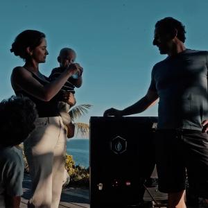 Family at home enjoying the water made from air with their WaterCube® 10