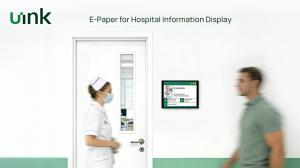 uink VE133 13.3-inch full-color e-paper display mounted in a hospital, showing doctor name, department information, and schedule with glare-free paper-like readability.