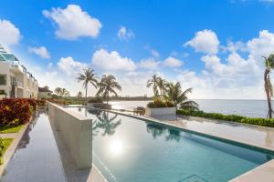 Luxury Condos with Pool Overlooking Sea