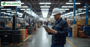 Supply chain manager analyzing logistics data and procurement workflows inside a manufacturing facility