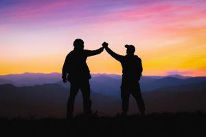 Healthy middle-aged man exercising outdoors representing improved vitality and strength through Mosaic Medicine hormone optimization program.