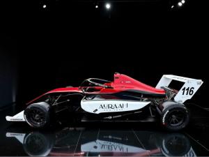 Auraah New York 2026 racing livery displayed on the full side profile of Yana Kapoor’s red, white, and black Formula Pro USA race car in partnership with World Speed Motorsports.