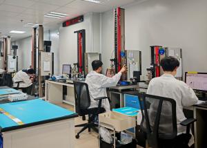 Technicians at work within SGS's Guangzhou-based rubber materials laboratory.