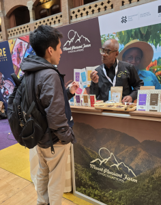 Averell French from Mount Pleasant Chocolate speaking with a buyer during the tradeshow.