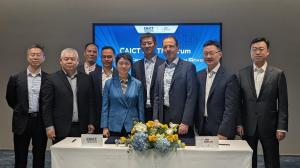 Andy Tiller, TM Forum, and Zhiqin Wang, CAICT, sign landmark partnership agreement at Mobile World Congress 2026