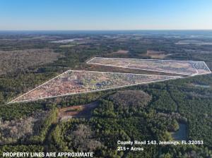 Aerial view of approximately 215 acres of land along County Road 143 in Jennings, Florida near I-75 Exit 467. Property boundary lines are approximate.