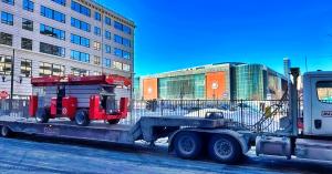 MAZZOTTA RENTALS delivers a MEC scissor lift to the area near the Prudential Center in New Jersey.