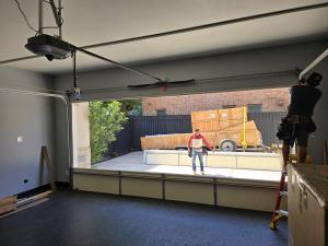 Easy Garage Door Repair professional realigning an off-track garage door to safely restore operation.