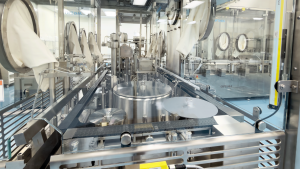 Interior view of BioTechnique’s Optima filling system with glove‑port isolators, conveyor paths, and lyophilizer loading interface visible in the background.