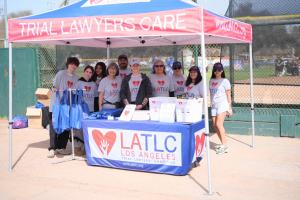 Los Angeles Trial Lawyers Charities volunteers at Heartwell Park celebrating their 10th anniversary with Bambino Buddy Ball on March 7