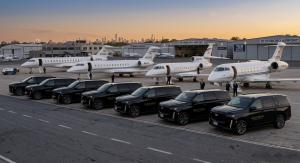 A luxury black SUV from Black Prime Limousine parked at a New York airport terminal, offering professional JFK airport transfer and limo near me services.