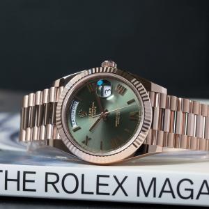 Rolex Day-Date 40 in Everose gold with olive dial (Ref. 228235). High-end Rolex models remain highly sought after in the secondary luxury watch market.