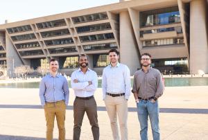 Four of City Detect's founding team members stand in a line outside of Dallas's City Hall.