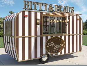 “Bitty & Beau's coffee truck serving freshly brewed coffee to customers outdoors in Pittsburgh.”