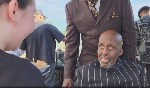 Charlie LeRoy and Bill Duke smile and share Birthday wishes