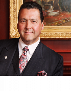 The photo is a headshot of Alfredo J. Molina, CEO of Molina Fine Jewelers.