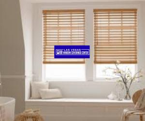 Blackout cellular honeycomb shades pulled down over a Las Vegas bedroom window.