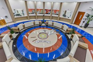 colorful eagle medallion in terrazzo on the atrium floor of a medical clinic