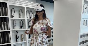 Client reviews a custom home design using Design Tech Homes’ Quantum VR platform.