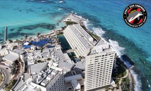 The dolphin tanks at the Hyatt Ziva Cancún, in Mexico, just meters way from the open ocean.
