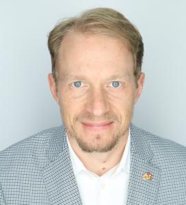 Headshot of Garret Biss, retired Marine Corps officer and speaker on veteran wellness and resilience