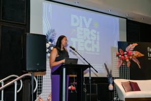 woman speaking at podium