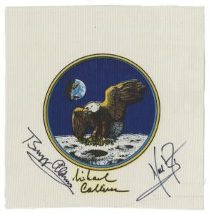 An Apollo 11 fireproof Beta cloth bearing the Apollo 11 mission emblem signed by all crew members and pre-certified by space expert Steve Zarelli. Estimate: $3,000-$4,000
