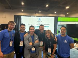 FranchiseFilming team photo at IFA 2026 featuring Trevor Rappleye, Dianne Davis, and team members at the FranchiseFilming booth