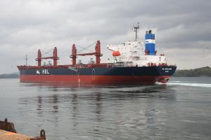 Bulk carrier HSL Geraldton makes initial voyage sailing on toward the open sea.