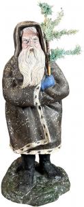 Enormous, 24½-inch-tall papier-mâché Santa figure from the late 1800s, with a wonderful styling, plus great form and impression, in excellent condition. Provenance: Ed & Brenda DeGarbolewski collection. Sold for $26,400
