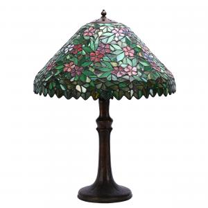 Leaded glass table lamp signed Handel, in the beautiful Apple Blossom design, 24 inches in height and set on the original marked Handel three-light base. Estimate: $1,500-$3,000