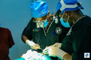 Volunteer Surgeons and Nurses turne classroom in the bush of East Africa into surgical suites